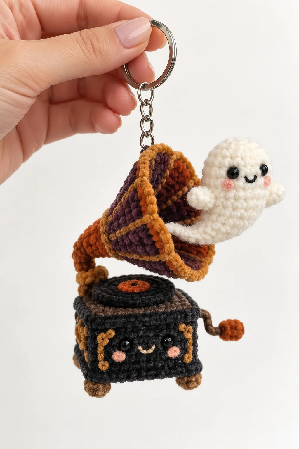 Handmade plush yarn ghost riding in a vintage Halloween pickup truck crochet keychain
