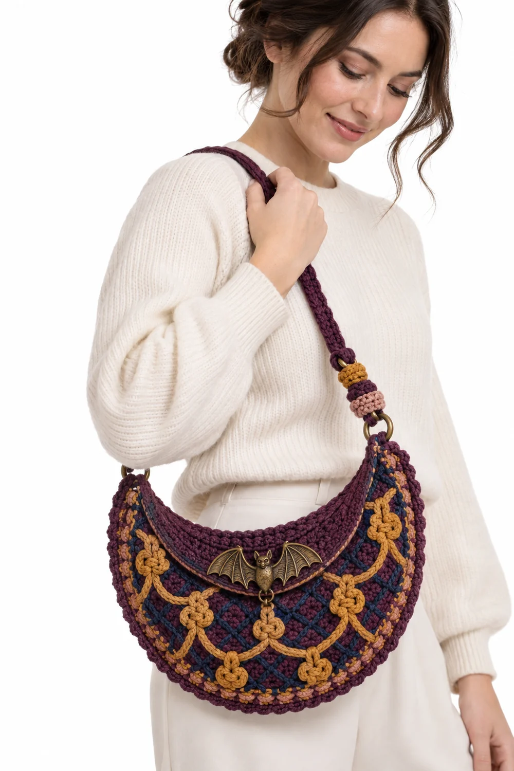Aubergine crochet crescent moon shoulder pouch with bat clasp in reed knot lattice