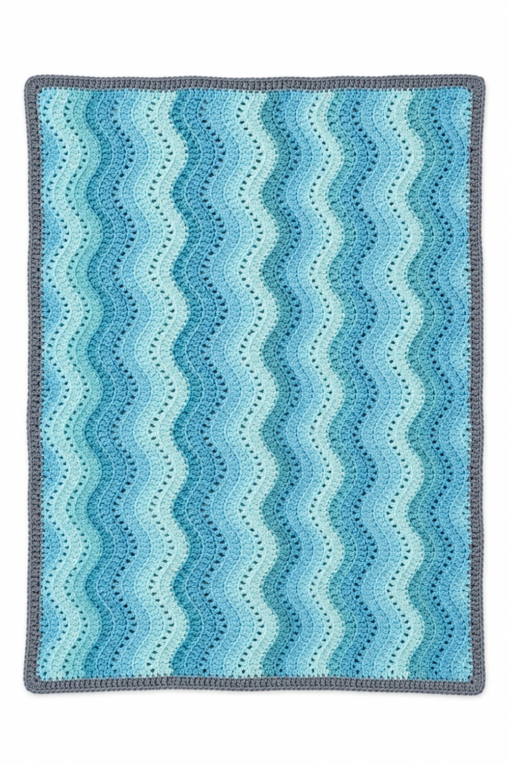 Crochet blanket with cascading blue and white waterfall stripes