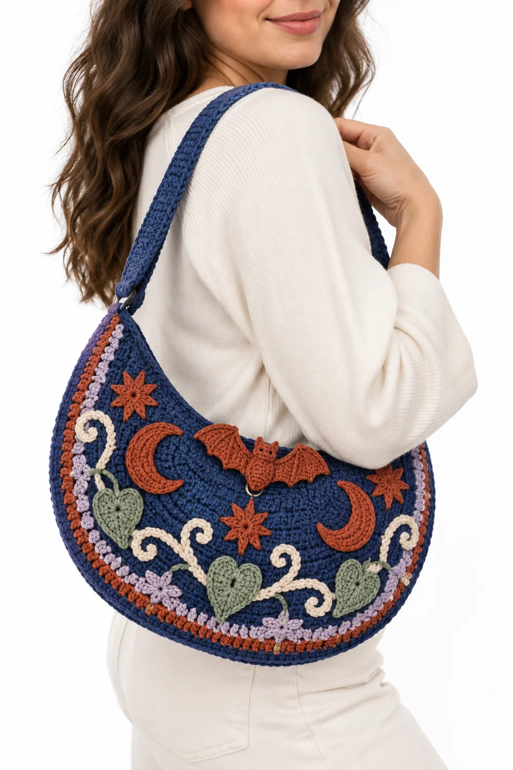 Cobalt blue crochet crescent moon shoulder pouch with bat clasp