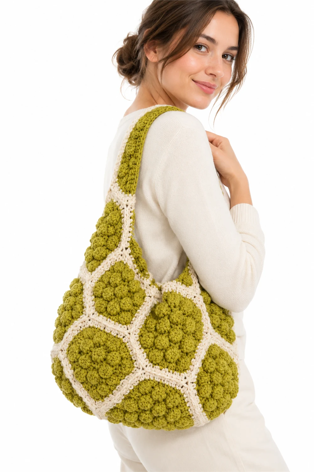 Golden yellow crochet hobo bag with cinched top and crust lichen texture