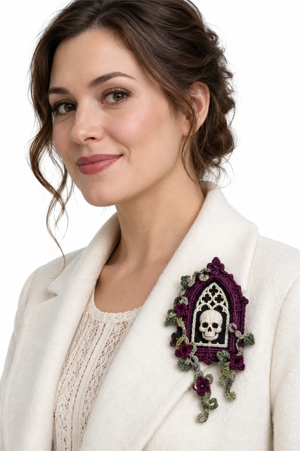 Plum purple crochet brooch shaped like an arched crypt window