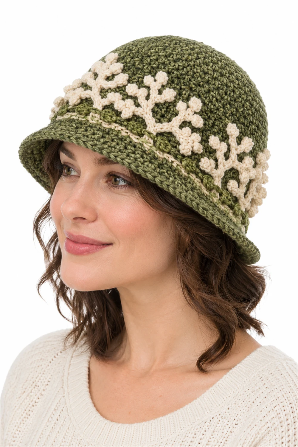 Pale green crochet cloche hat with turned-up brim and reindeer lichen texture